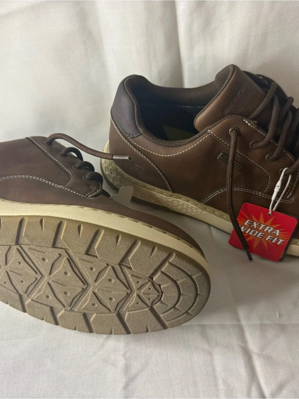 sckecher brown attire cushioned